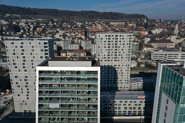Zurich with its modern city district number 5. The image shows several residential and office buildings captured during a sunny day in winter season.