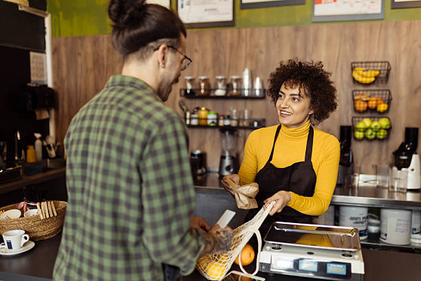 istock Man shopping grocery in the small store 2219685666