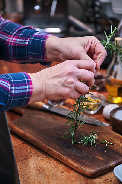 Preparing Rustic Butter Board with Olives and Herbs