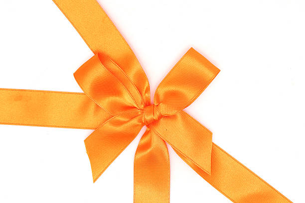 istock Orange ribbon isolated on a white background. 2219687662