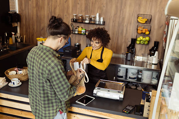 istock Man shopping grocery in the small store 2219689439