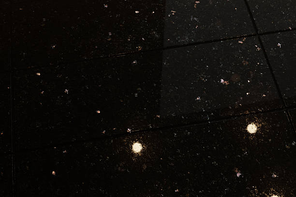 3D Rendering of black galaxy tiles reflection the light of ceiling
