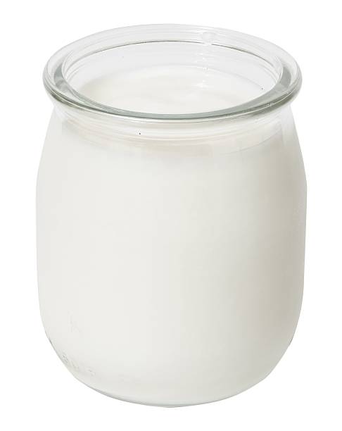 istock Yogurt glass jar isolated on white 2219702656