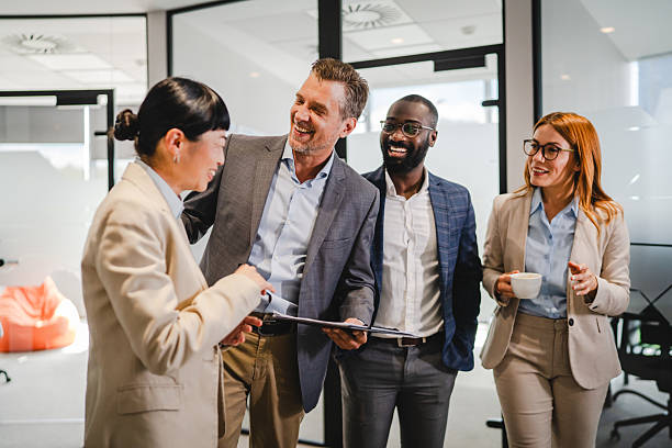 istock Multicultural businesspeople engaged in a casual office meeting 2219704324