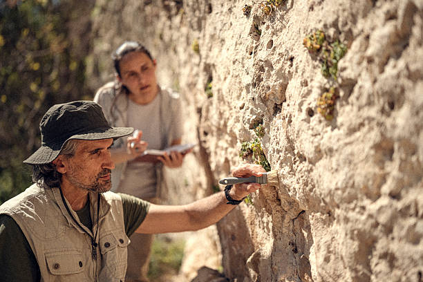 istock Paleontologists Team Working On Ancient Cliff Dwellings Site 2219706326