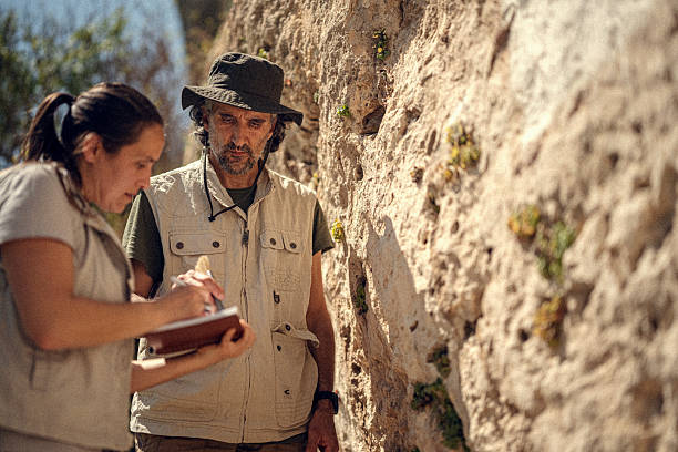 istock Archaeologists Team Working On Ancient Cliff Dwellings Site 2219706340