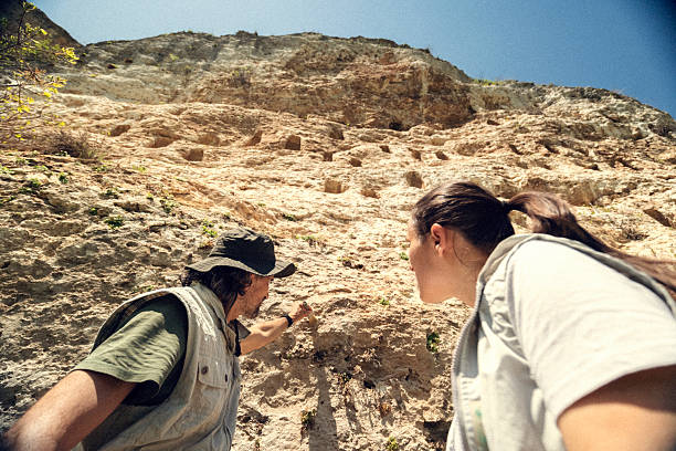 istock Archaeologists Team Working On Ancient Cliff Dwellings Site 2219706341