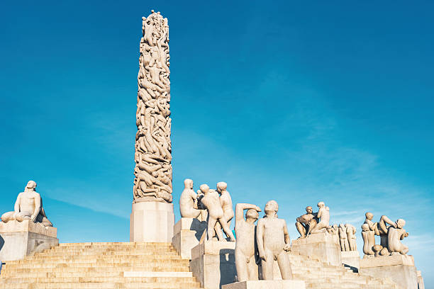The landmark Vigeland Monolith (1944) by Gustav Vigeland in Frogner Park, Oslo, Norway on a sunny day.