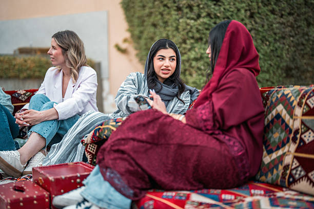 istock Diverse Females Engaged in Conversation in Majlis Setting 2219707193