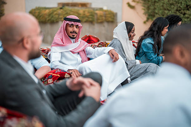 istock Diverse Social Gathering in Traditional Arabian Majlis 2219707211