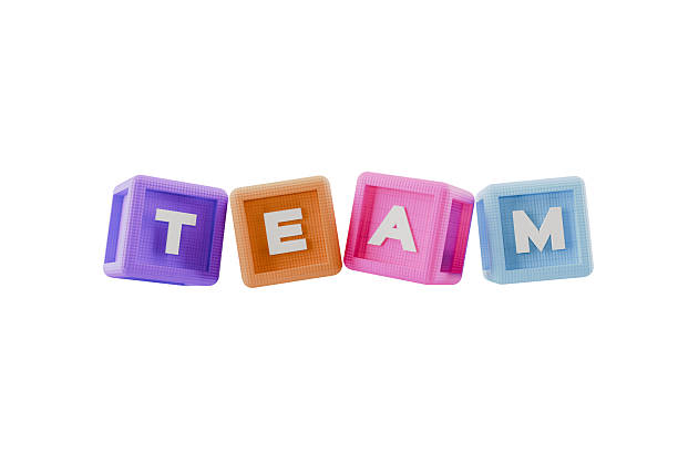 istock 3d building block alphabet cubes spelling team,  on white background 2219710233