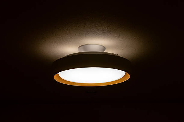 istock A circular lighting on the ceiling in the dark room 2219719730