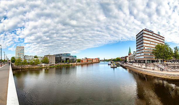 Bremen, Germany - May 12, 2016: skyline of Bremen seen from river Weser.