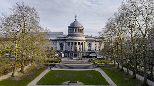 istock Aerial view of Parc du Cinquantenaire in Brussels, Belgium, with tree-lined paths and classical architecture, historic park with green lawns and monuments, urban landscape and tourism concept, Atticus 2219731868