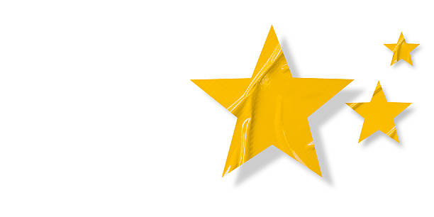 istock Crumpled yellow star pattern stickers, isolated on white background. 2219733771