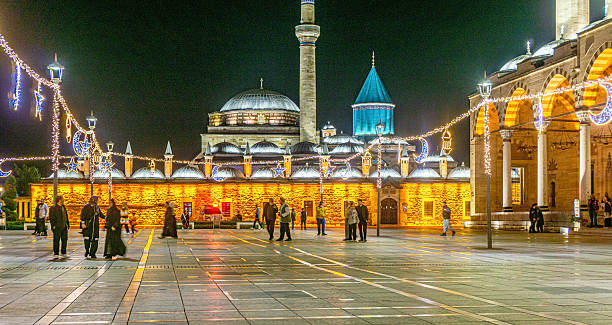 Mevlana Museum, Konya, Turkey - May 31, 2025: Poeple visiting the mosque and mausoleum of Mevlana the Rumi, in Konya, Turkey