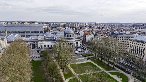 istock Aerial view of Parc du Cinquantenaire in Brussels, Belgium, with tree-lined paths and classical architecture, historic park with green lawns and monuments, urban landscape and tourism concept, Atticus 2219737711