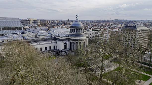 istock Aerial view of Parc du Cinquantenaire in Brussels, Belgium, with tree-lined paths and classical architecture, historic park with green lawns and monuments, urban landscape and tourism concept, Atticus 2219737763