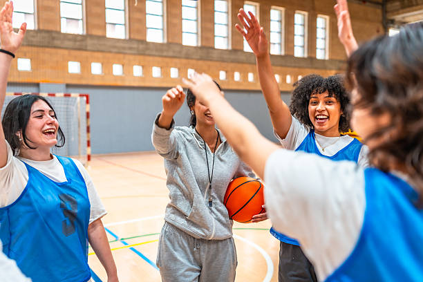 istock Female basketball team celebrating a successful training session 2219738338
