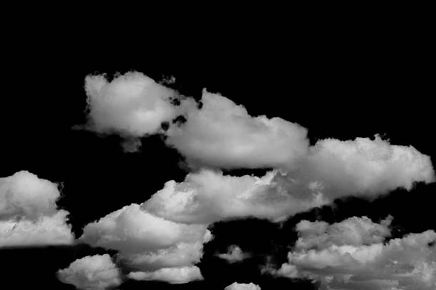 istock white fluffy clouds isolated on a black background, clipart 2219739694