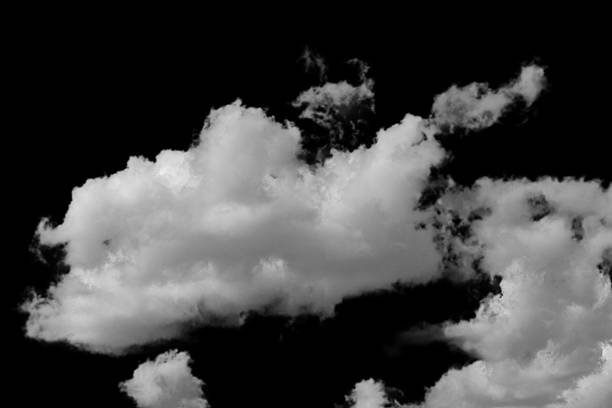 istock white fluffy clouds isolated on a black background, clipart 2219739801