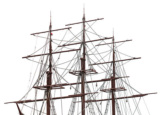 A large ship with a tall mast and a white background. The ship is old and has a lot of ropes
