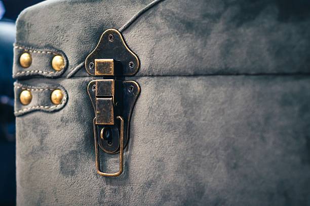 Blue suitcase with handle and black