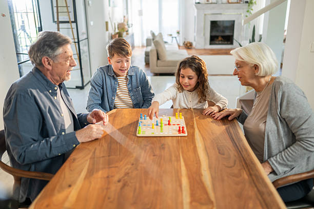istock Family Bonding Over Board Game at Home 2219743184