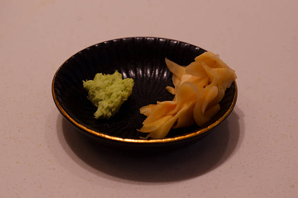 istock Prepare the finely ground wasabi and grated ginger on a plate. 2219747541