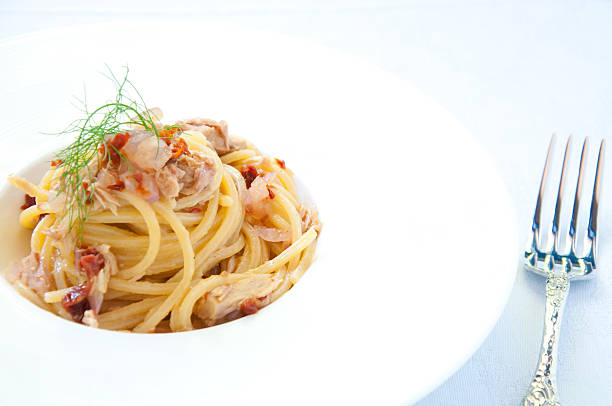 istock Spaghetti with pesto red onion and tuna 2219754958