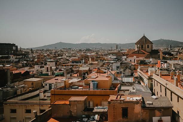 istock Panoramic view of Barcelona rooftops and Montjuic. 2219757792