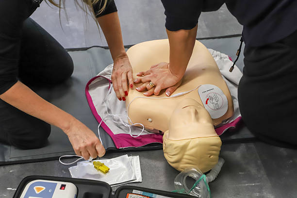 istock first aid course - company safety - cardiac massage - Basic Life Support 2219761519