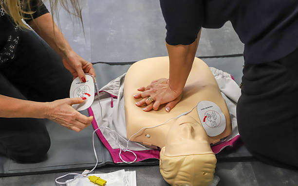 istock first aid course - company safety - cardiac massage - Basic Life Support 2219761523