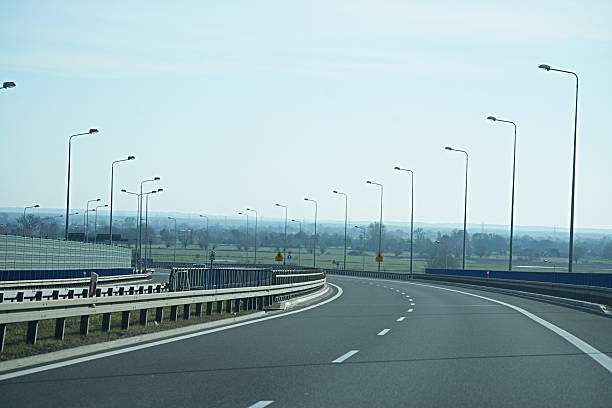 Horizontal photo of a high-speed freeway bending