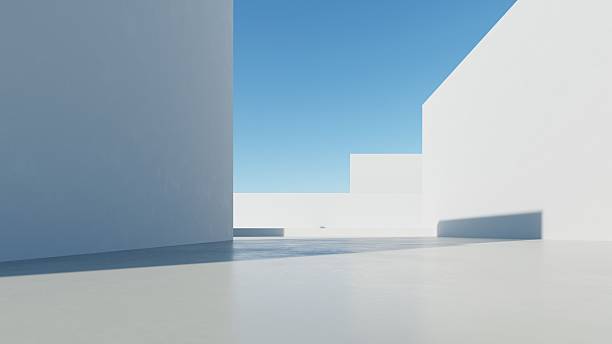 istock 3d illustration of abstract modern architecture background, Minimal geometry architectural design, Car presentation backdrop with empty concrete floor, Geometric white blocks building design 2219763460