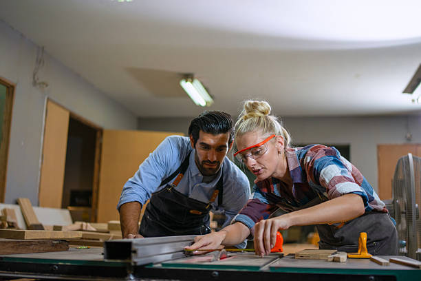 istock Carpenters are working together at workshop. 2219764782