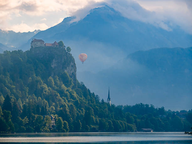hot air balloon at sunrise in the mountains