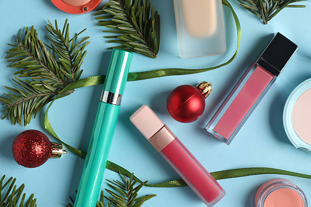 istock Makeup products and Christmas decor on light blue background, flat lay 2219768779