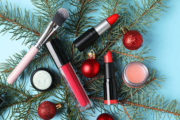 istock Makeup products and Christmas decor on light blue background, top view 2219768805