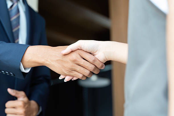 istock Handshake Agreement. Two professionals sealing a deal with a handshake. 2219769117