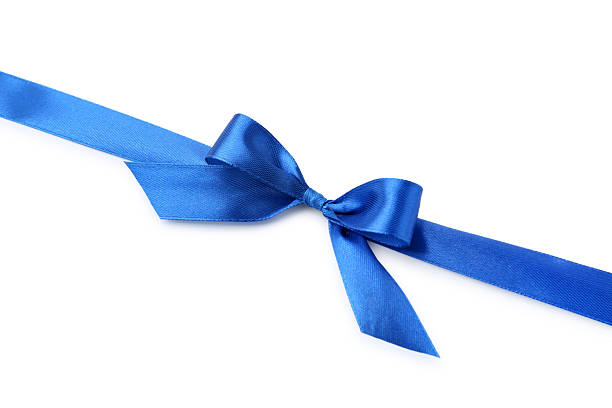 istock Beautiful blue ribbon with bow isolated on white, top view 2219770953
