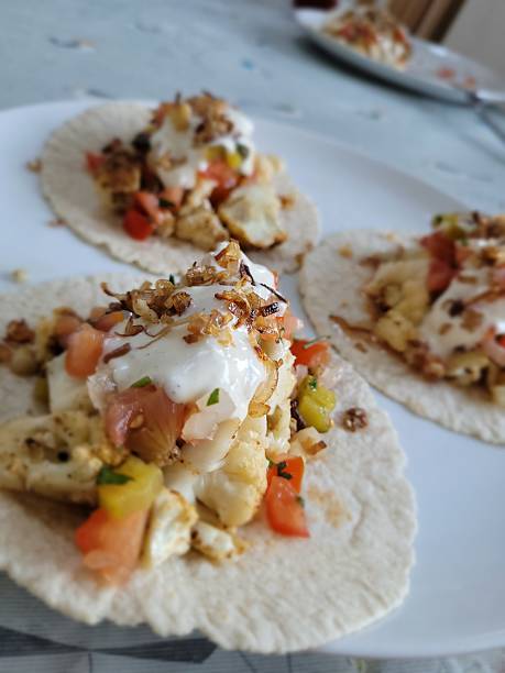 istock Crispy cauliflower tacos with capers, garlic aioli and crispy shallots 2219771827
