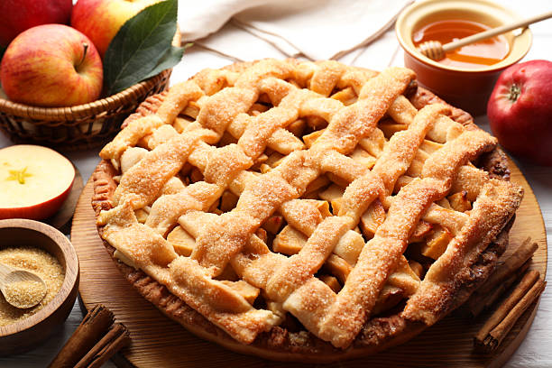 istock Tasty homemade apple pie and ingredients on table, closeup 2219776316