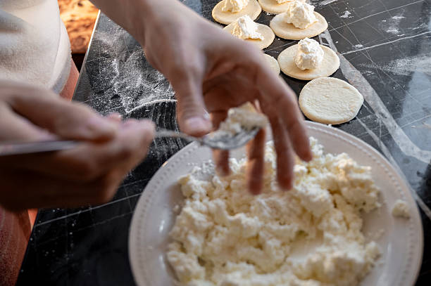 istock Forming dumplings, close-up of hands at work. 2219779205