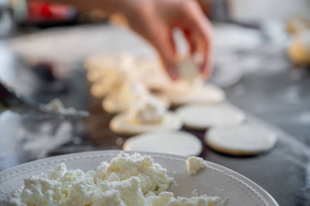 istock Forming dumplings, close-up of hands at work. 2219779207