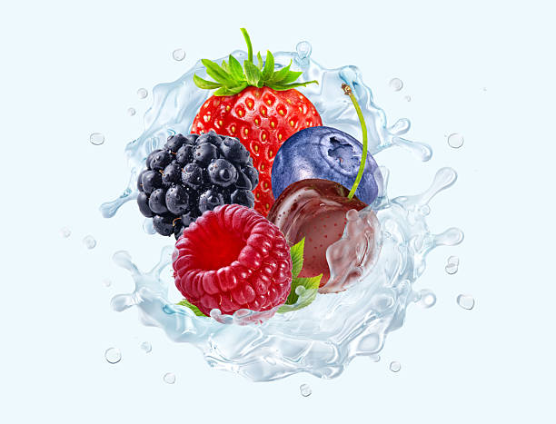 istock Mixed berries and water splash isolated on light blue background. 2219782093