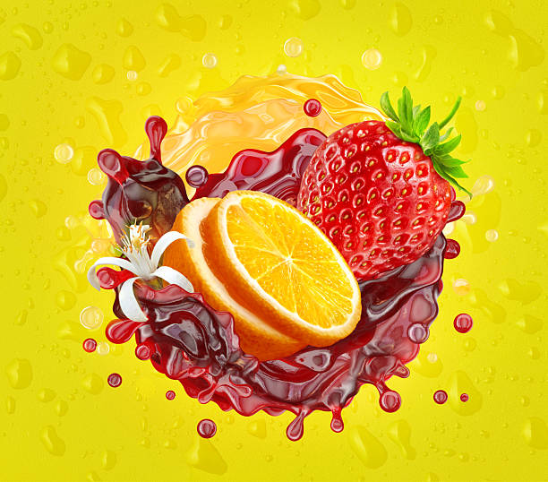 istock Strawberry and orange slices with juice splash on yellow background. 2219789838