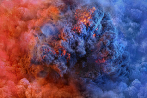istock Colorful smoke explosion, red and blue hues, abstract art. 2219789874