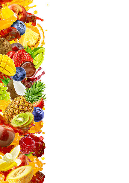 Colorful mix of tropical fruits and juice splashes on white background