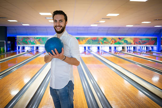 istock At the Bowling - Young Man 2219793240